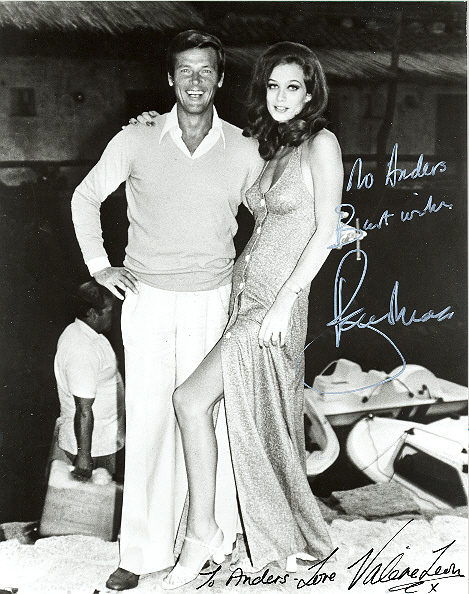 Sir Roger Moore and Valerie Leon 10x8, black and white