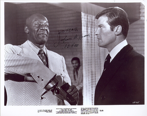 Julius Harris, pictured with Sir Roger Moore 10x8 black and white photo