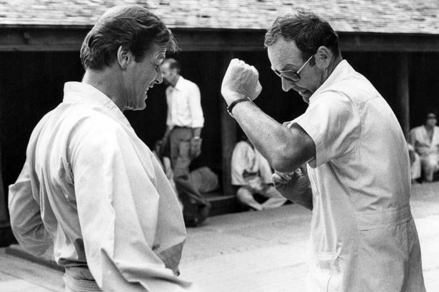 Roger Moore with Guy Hamilton on the set of The Man with the Golden Gun in Thailand