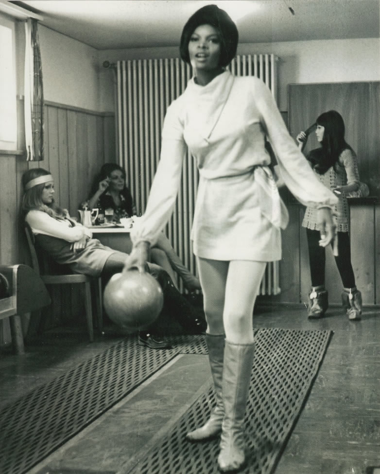 Sylvana Henriques and Mona Chong playing bowling during the filming of OHMSS
