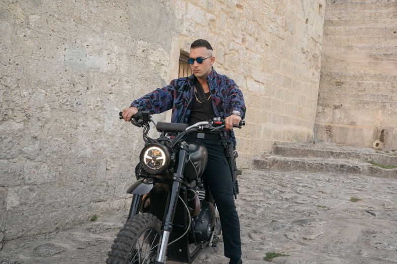 Primo on his Triumph Scrambler 1200 XE in Matera, Italy for No Time To Die