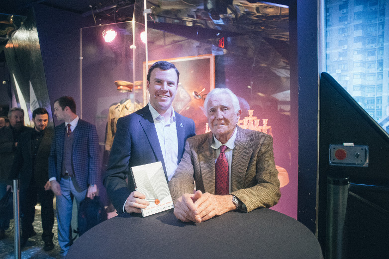 George Lazenby with guest at International Spy Museum