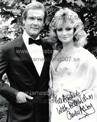 Carole Ashby, pictured with Sir Roger Moore Black and white